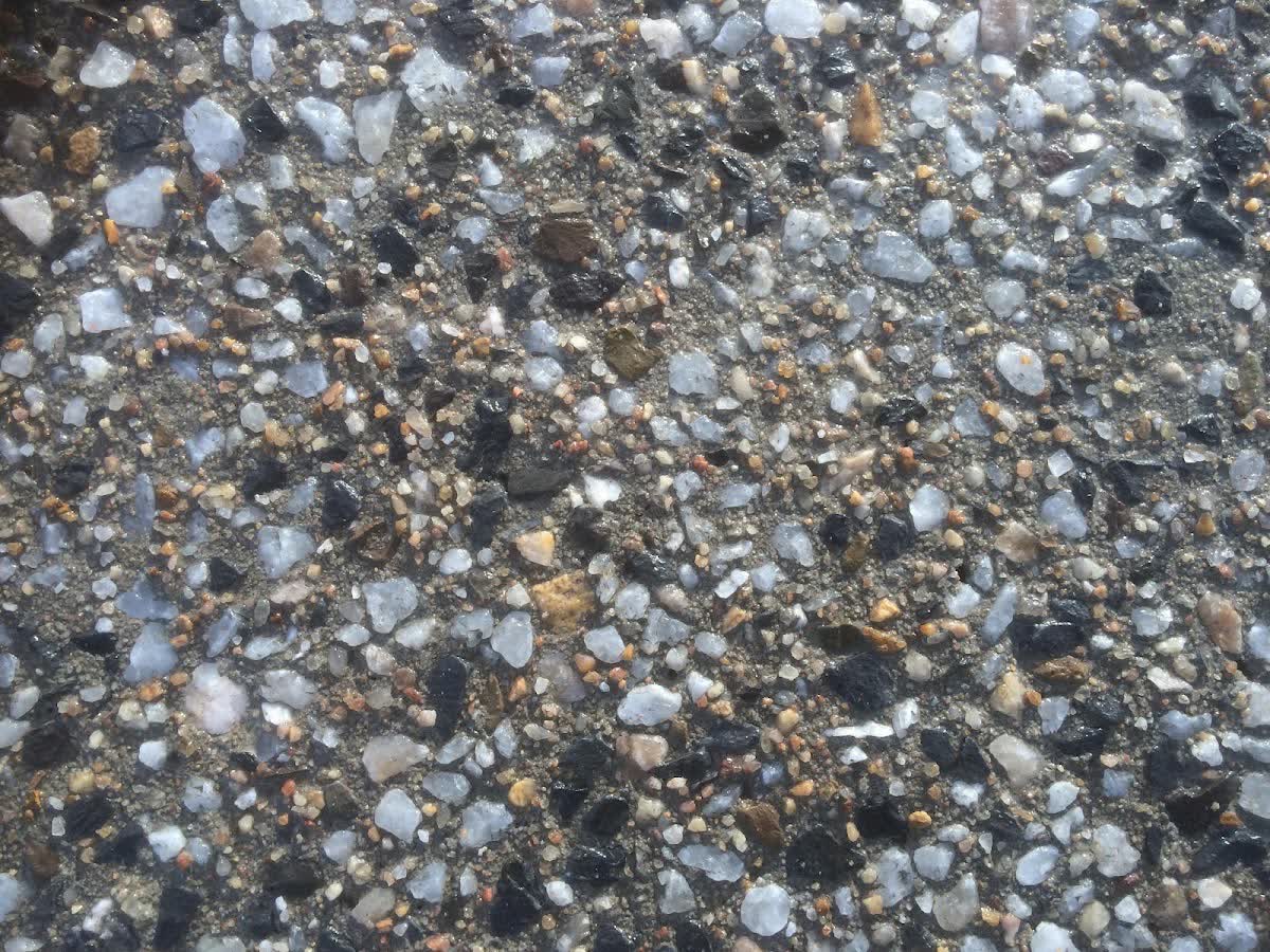 Close-up of the stone and pebble texture in one of Andy's exposed-aggregate finishes